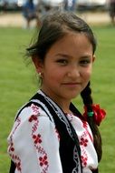 girlie dressed in the traditional costume of a peasant woman