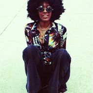 man with afro haircut in hippie styles