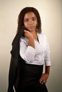 black businesswoman is holding jacket