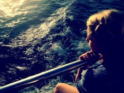 girl looking at the ocean