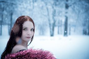 beautiful woman posing in winter park