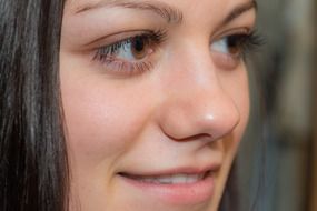 Dark haired young girl smile portrait