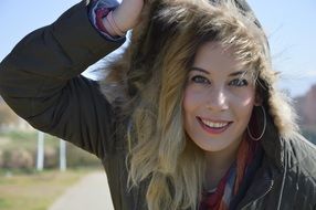 Young woman is posing for the photo