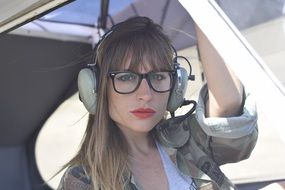 aircraft woman pilot in glasses