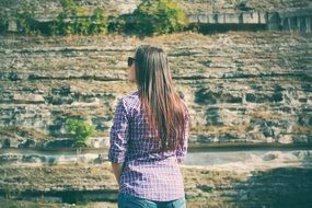 Back view of the woman on the field