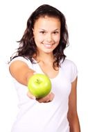 green apple in girl's hand