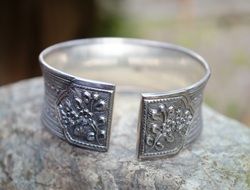 silver bracelet as cuffs