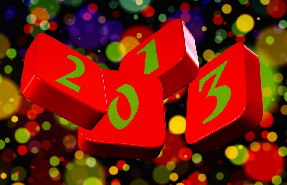 figures 2013 on the background of Christmas lights
