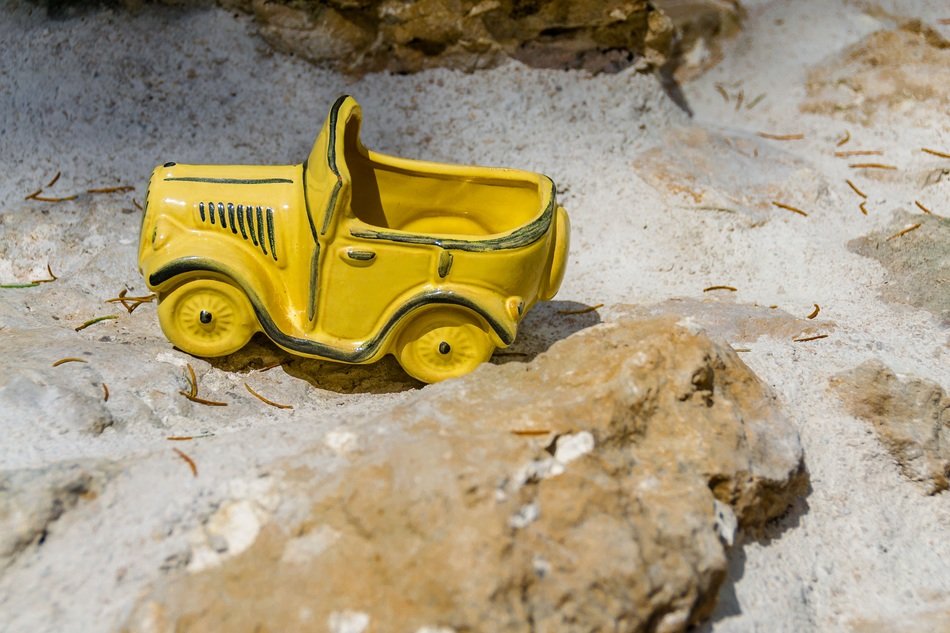 auto yellow ceramic toy car stones