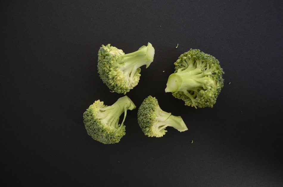 brokoli vegetables black background