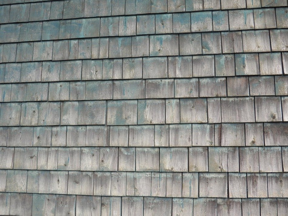 imitation of bricks on wooden fence