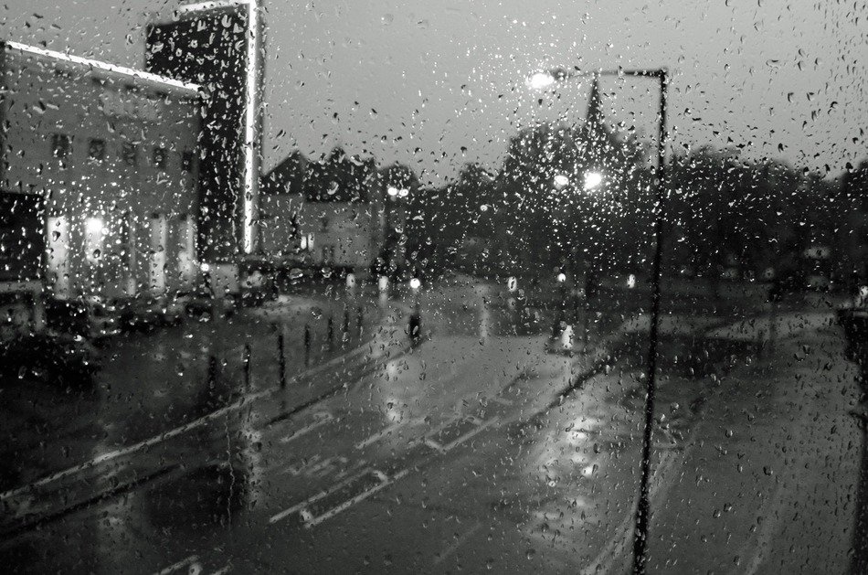 raindrops drops window black white