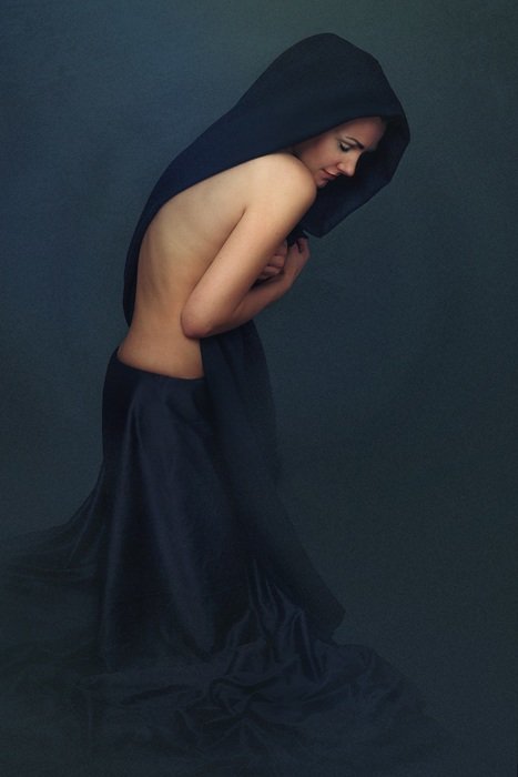 Young woman in the dark clothing