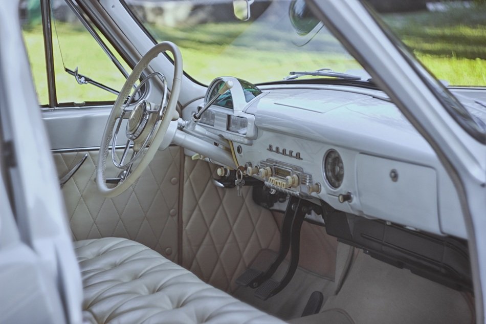 Inside of white classic automobile