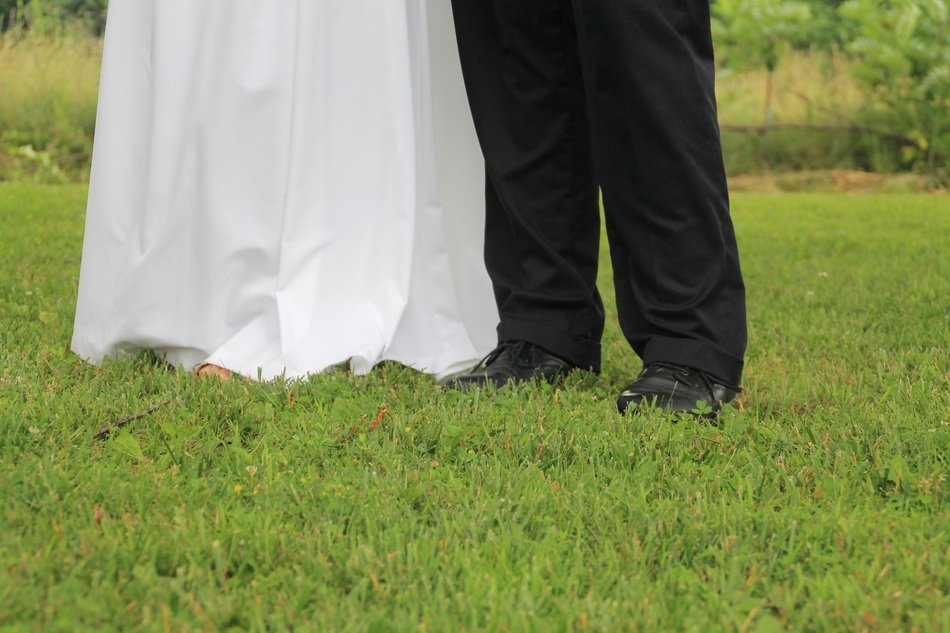 photo of the feet of the newlyweds