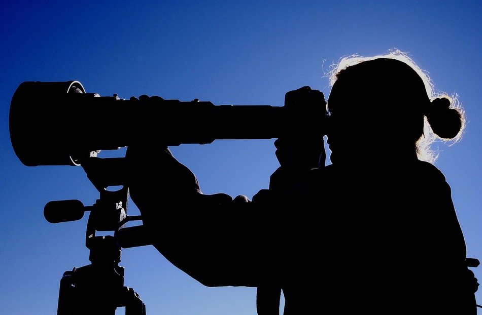 girl looking at the lens against the sky