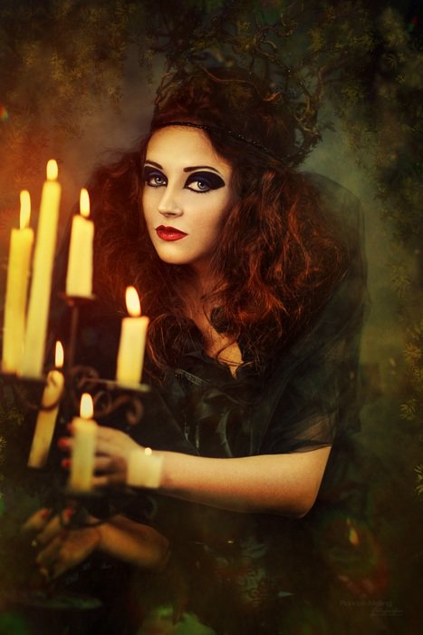 Curly haired Woman candle in front Vintage photo