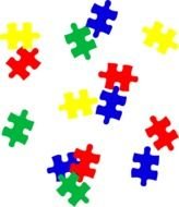 puzzle pieces of different colors on a white background