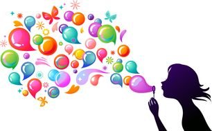 girl blowing colorful bubbles