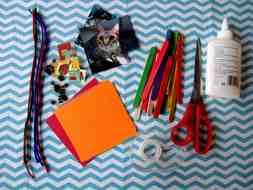 scissors, glue, tape and pictures for crafts