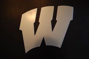 shining metal letter W at darkness, Plasma Cutting