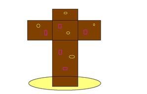 painted brown cross with polka dots