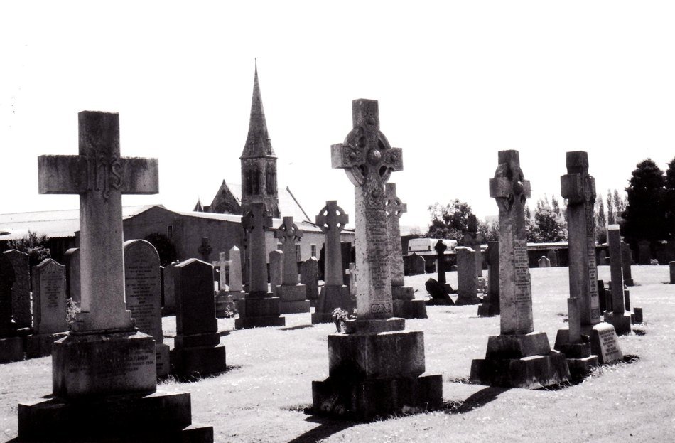 Black and white photo of gravestones