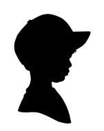 black profile of a boy in a cap
