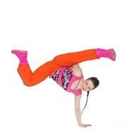 girl in a bright costume antsat hip-hop