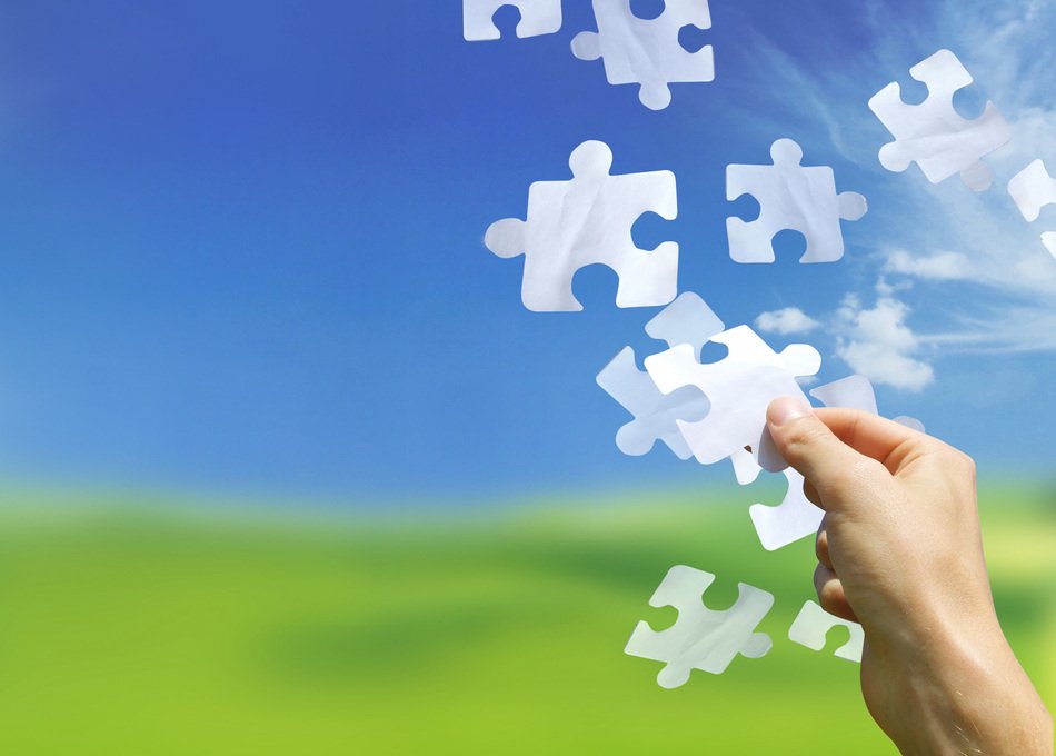 man arranges puzzles in the picture