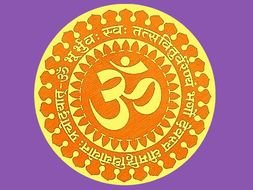 hot colored Om Symbol at purple background