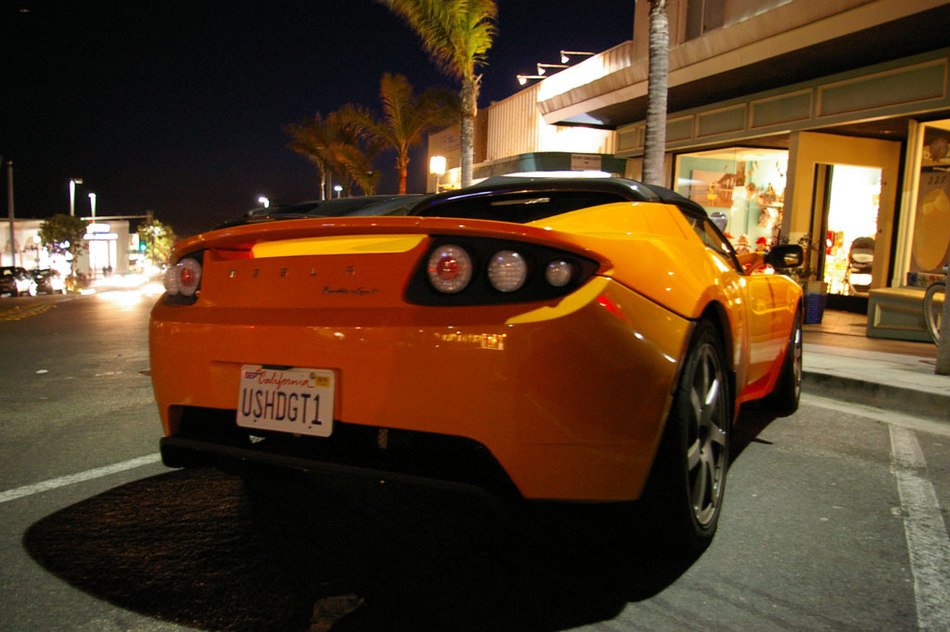 orange sports car parked