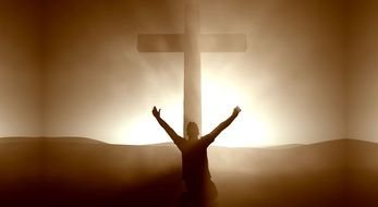 picture of a praying man near the cross