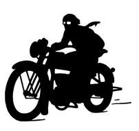 black silhouette of a man on a motorcycle
