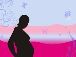 Silhouette of Pregnant woman at colorful background