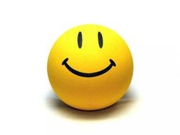 photo of a yellow ball with a smile