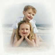 Photo of the girl and boy near the sea