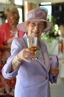 Adult lady cheers drink wedding