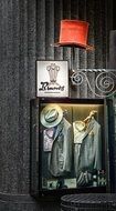 fashionable men's clothing and hats are exhibited in the store