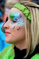 woman with decorative make up on the carnival