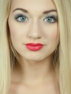 Portrait of blond girl with red lips