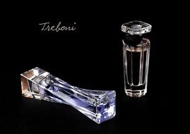 perfume bottles on a black background