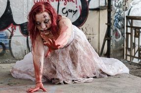 girl in a white dress with zombie makeup