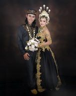 married wedding couple in traditional costumes