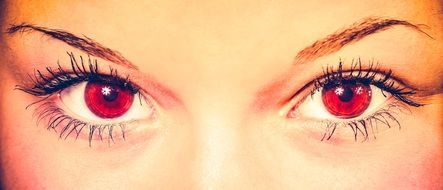 female eyes of red color