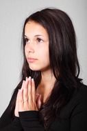 attractive beautiful girl praying