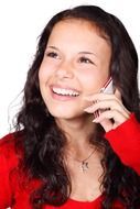 smiling young girl calling mobile phone