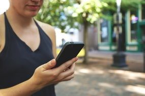 girl with a black smartphone