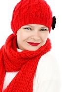 beautiful face of woman in a red hat and scarf