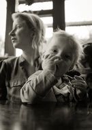 mother with kid in cafe